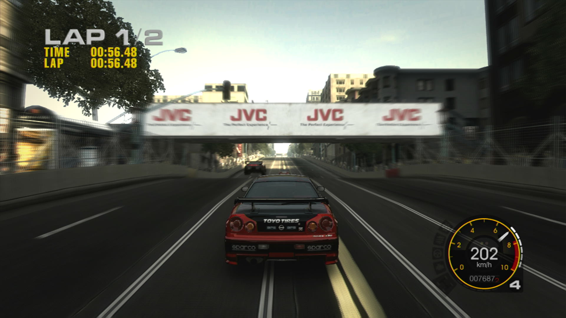 Zooming up hill at San Francisco with a Nissan Skyline GT-R Z Tune in chase cam. There is a Supra ahead going over a crest at a intersection getting some airtime.