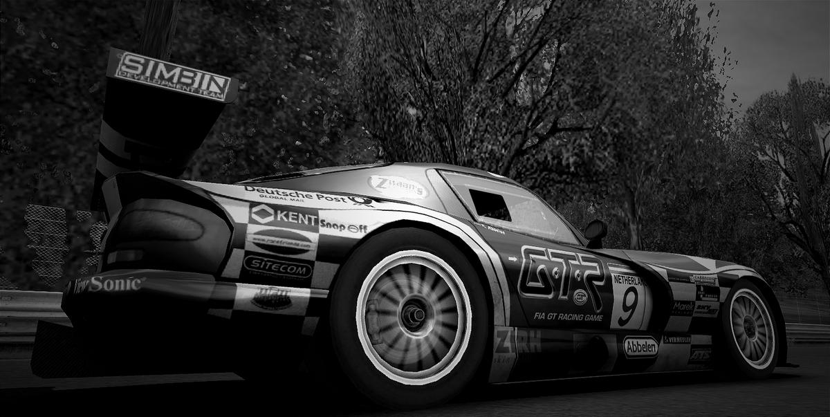 A rear-quarter screenshot of a Dodge Viper GTS-R in black and white. On the door of the Viper it has the GTR logo from the original GTR racing game.